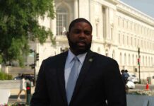 Red-State Formula – Crowd ERUPTS As Donalds Dares Dallas Man in a suit speaking outside a neoclassical government building