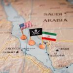 Houthi Barrage Slams Trade Lifeline Map with US, pirate, and Iran flags near the Red Sea