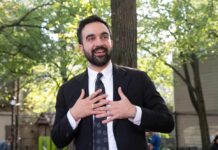 Landlords Beware: Brooklyn Playbook Escalates Man in suit speaking with hands on chest outdoors