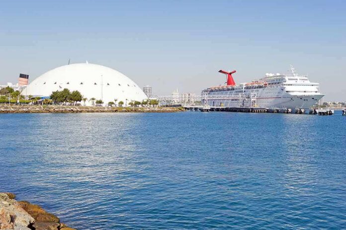 Cruise ship docked beside a large white domed building