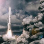 Rocket launches through dense clouds