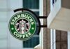 Coffee Giant’s Sudden Cutback – Turnaround or Trouble Brewing? Starbucks coffee shop sign on building exterior