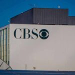CBS building exterior with logo and satellite dishes
