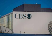 CBS building exterior with logo and satellite dishes