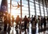 Air War Warning: Saudi Skies Declared Deadly Passengers queue inside an airport terminal at sunset