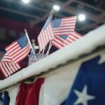American flags on display at an indoor venue