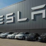 Wall Street Blindsided – Delivery Beat Rockets Tesla Shares Tesla cars parked outside a large Tesla building