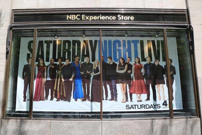 shutterstock_688417363 Window display with Saturday Night Live cast poster at NBC Experience Store