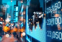 Global Gatekeeper Squeezes Indonesia – Billions At Risk digital stock market chart on city street at night